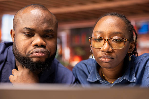 istock African American couple works from home collaborating on a freelance project 2215518250