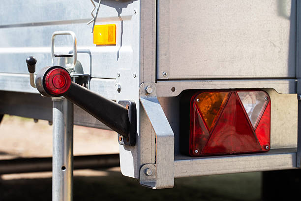 istock Electric turn signal, brake light and side lights on galvanized trailer, close-up 2215520970