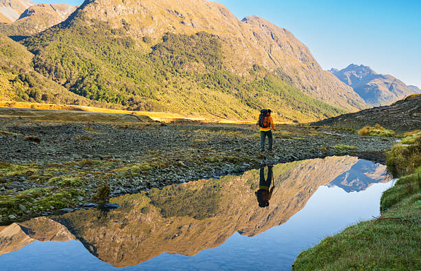 istock Male explorer with hiking pole out at weekend. 2215521265