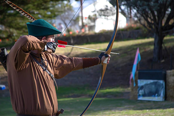 A individual redhead viking archer warrior in the north European countryside