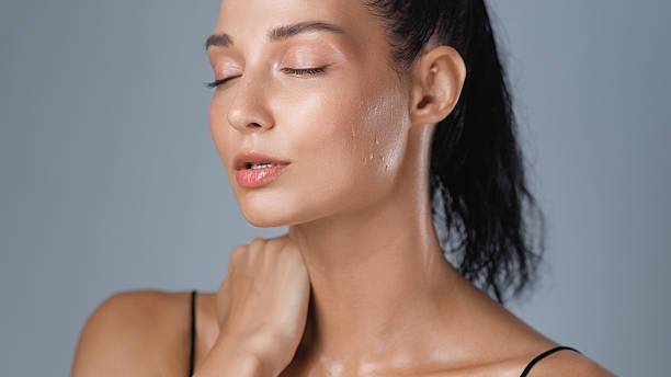 istock Fit Woman with Closed Eyes Relaxing After Workout in Studio Setting 2215525185