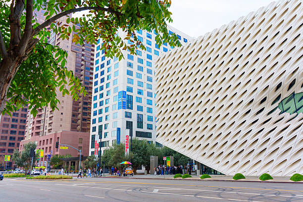 Los Angeles, California - December 4, 2024: Vibrant street view near The Broad Museum showcases contemporary architecture, with a focus on the unique facade of the museum and the surroundings.