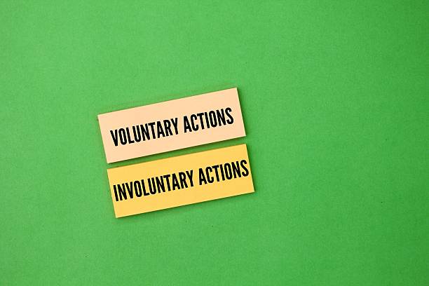 istock colored paper with the words voluntary and involuntary actions. Those actions which need thinking and are performed by us knowingly are called voluntary action 2215532687