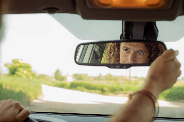 istock Latino man with his car 2215535038