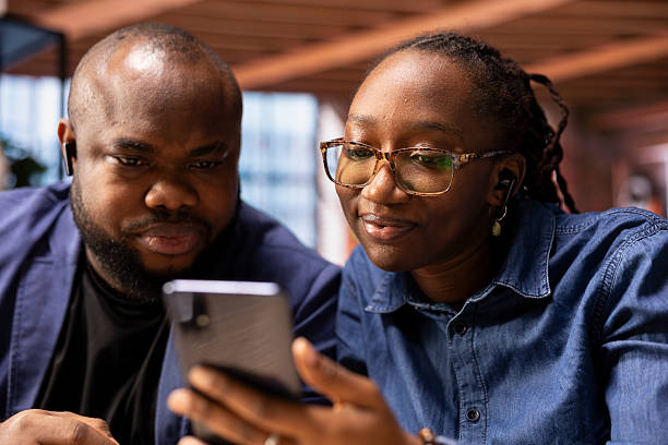 istock Confident black couple greeting colleagues on a video conference discussion 2215535580