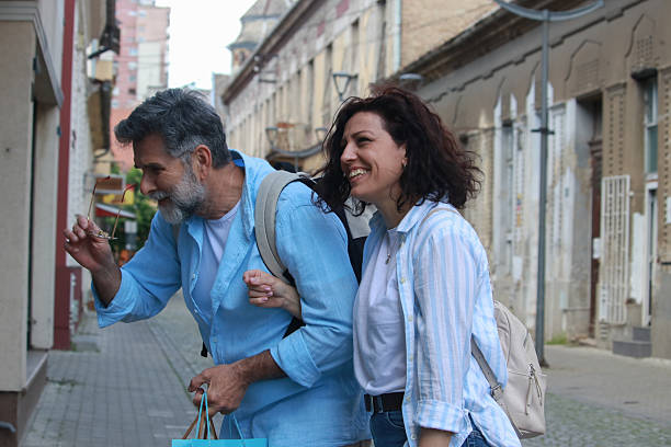 istock Mature couple in the shopping enjoy 2215538355