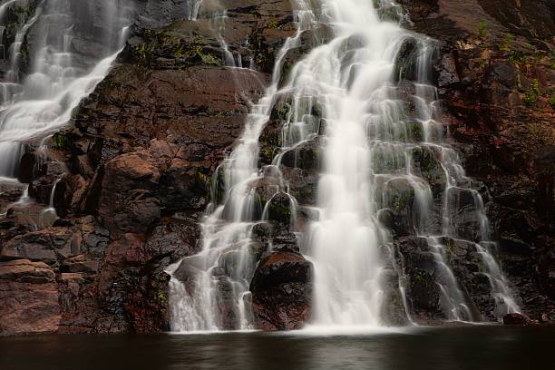 Aerial views of a Waterfall on a full moon night in the Australian mountain ranges