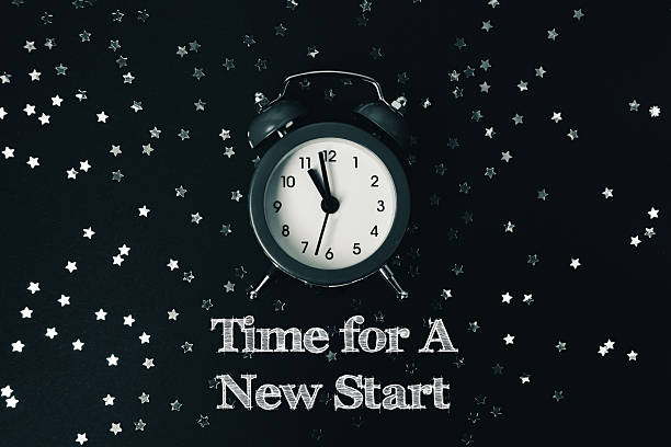 istock Black and white clock with the time of 11:00 2215546533