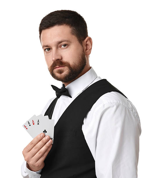 istock Professional croupier with playing cards on white background 2215549200