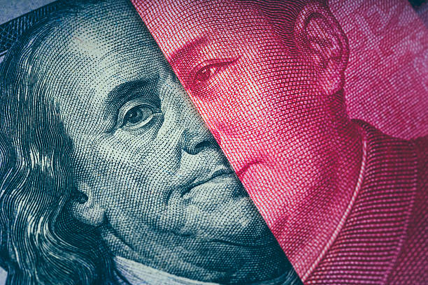 100 US dollar and 100 Chinese Yuan， conflict,trade war,battle, tarriff war between USA and China.