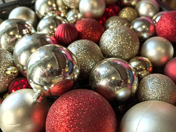 istock Holiday ornaments in vibrant red and silver create a festive arrangement 2215552063