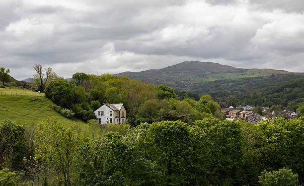 istock cottage in a welsh landscape 2215553306