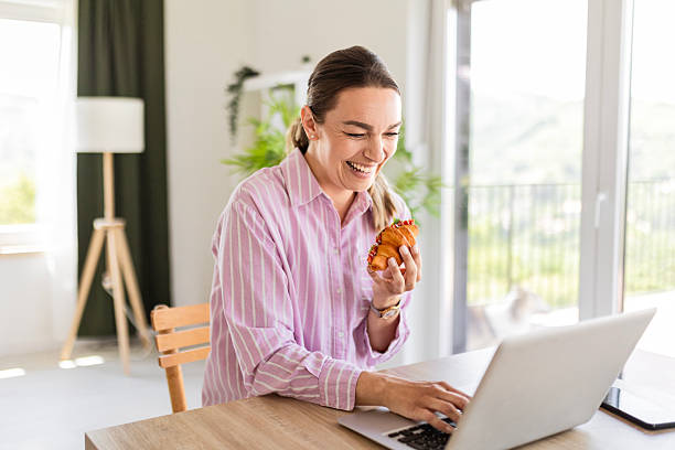 istock Fashionable Woman Multi-Tasking 2215555256