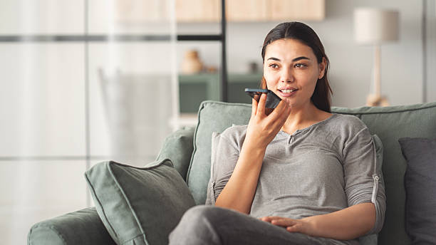istock Woman talking on the phone at home 2215555818