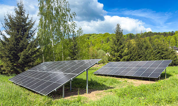 istock Solar panels on the land structure on a bright summer day 2215568016