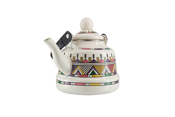 istock Vintage metal old kettle with patterns isolated on white background 2215568122