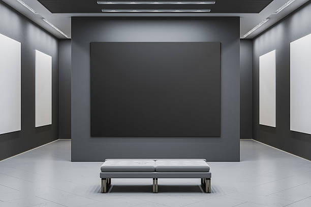 istock Blank black canvas mockup in modern gallery with white bench under spotlight for branding or design template presentation concept. 3D Rendering 2215568495