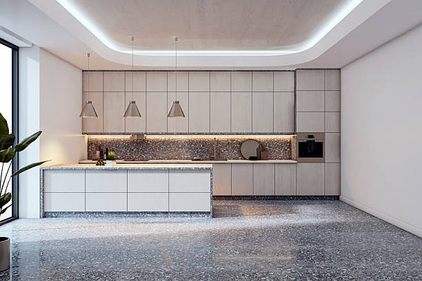 istock Modern minimalist kitchen interior with natural lighting, terrazzo floor, wooden cabinets, and sleek ceiling lights in stylish empty room. 3D Rendering 2215568829
