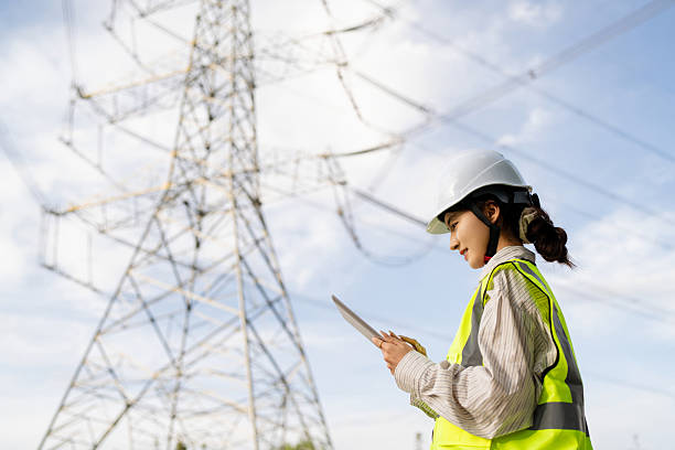 istock Asian female power technician working at power station 2215573836