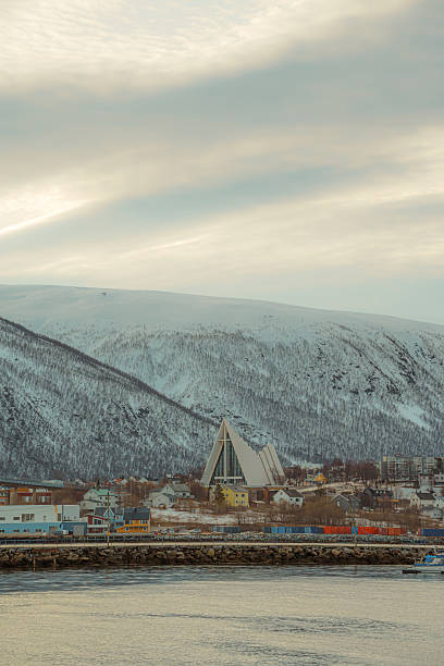 istock Arctic Cathedral and Tromso City in winter light 2215574094