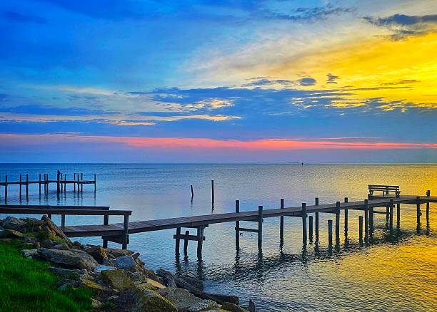 istock Colorful dawn sky over Chesapeake Bay and piers 2215591888