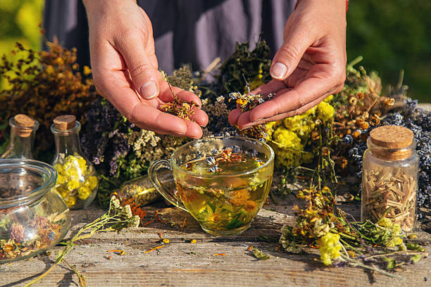 istock A woman brews herbal tea. Selective focus. 2215594015