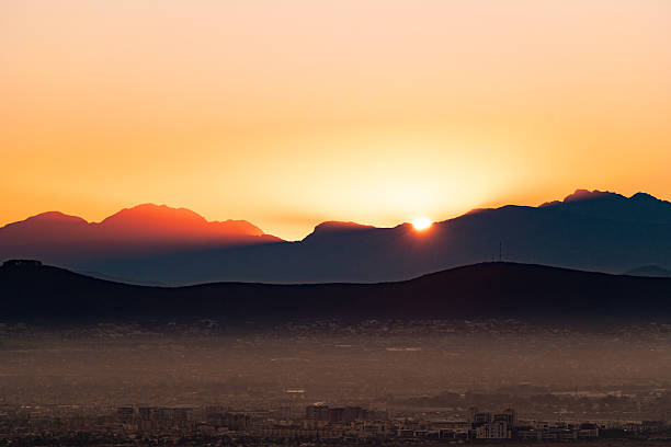 Morning sun above Western cape hills