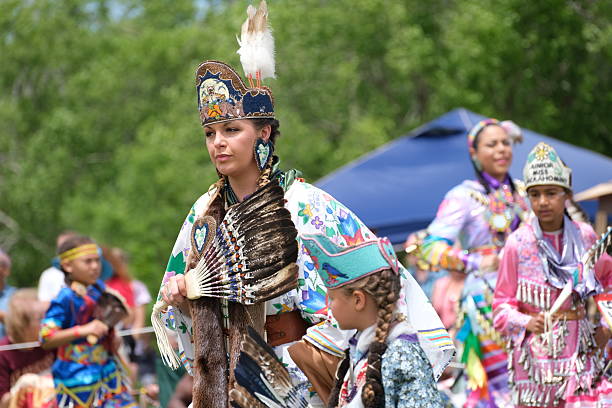 Virginia Beach, Virginia: USA, May 17th 2025:  Indian pow wow of the Nansemond Tribe out of Suffolk, Virginia inviting spectators to join into the dancing. The Nansemond have been recognized as a Native American tribe by the Commonwealth of Virginia, along with ten other Virginia Indian tribes. They are not Federally recognized but are one of six Virginia tribes without reservations that are included in a bill for Federal recognition un