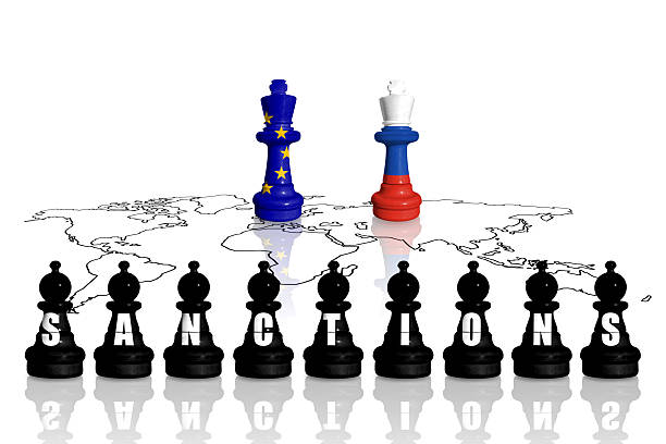 istock Europe Union sanctions and embargo for Russian war and aggression in Ukraine. Chess made from flags of EU and Russia. 2215596984