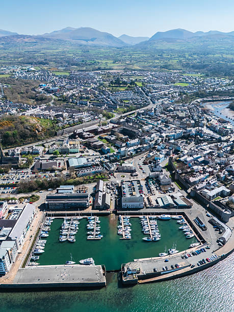 istock Caernarfon cityscape featuring its marina and surrounding mountains in background 2215602833