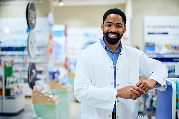 istock Friendly Pharmacist Standing Inside a Modern Pharmacy With a Welcoming Smile 2215622848