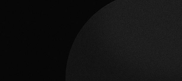 Grey abstract wavy lines with a reticulated texture on a black background, ideal for modern tech visuals or minimalist decor.