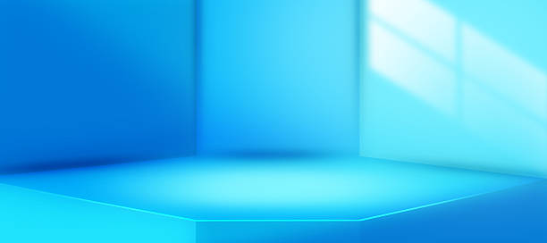 istock Blue 3D background featuring an interior corner wall room with abstract window lighting and a stage scene. This minimalist design is perfect for use as an empty product studio, display backdrop, or modern interior setting 2215631731