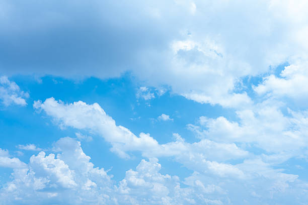 istock Stunning Blue Sky with Fluffy White Clouds Peaceful Nature Background Image 2215632072