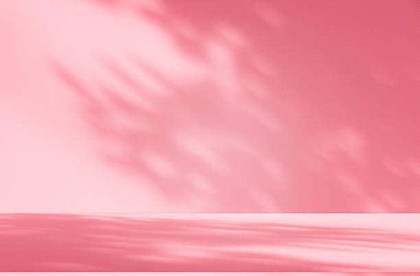 istock Wall interior background, studio, and backdrops show products. with shadow from window color white and pink light. background for text insertion and presentation of product 2215637592