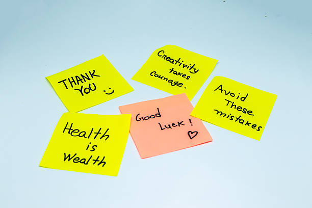 istock Positive affirmations concept. Phrases of different colors sheets for notes on a white background. Motivational concept with handwritten text. 2215638199