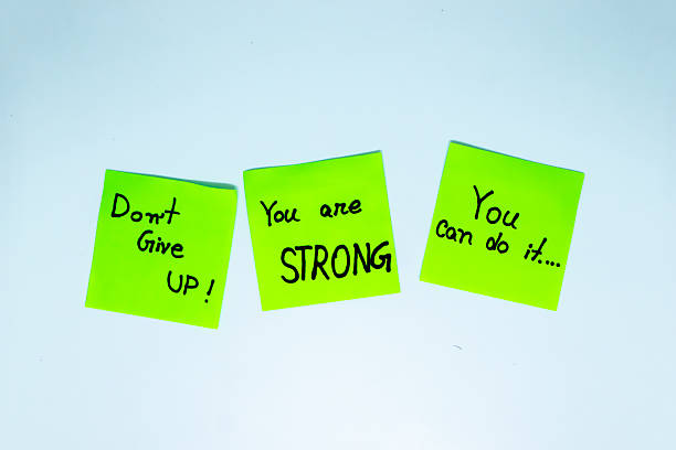 istock Positive affirmations concept. Phrases of different colors sheets for notes on a white background. Motivational concept with handwritten text. 2215638363
