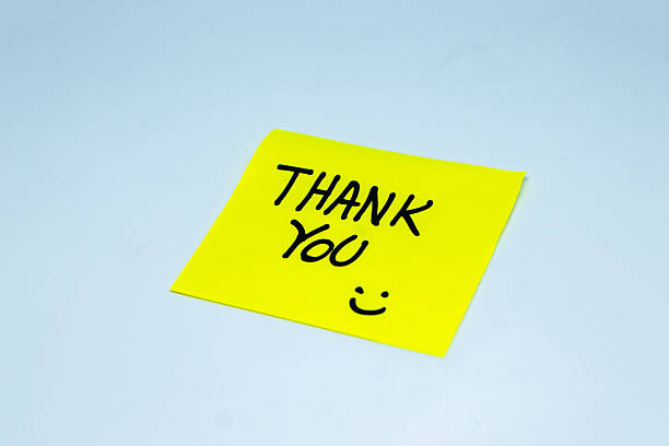 istock Thank You concept. Thank you on sticky notes isolated on white background 2215638495
