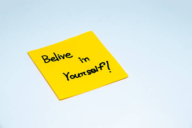 istock Positive affirmations concept. motivation words on sticky note with isolated background 2215638503