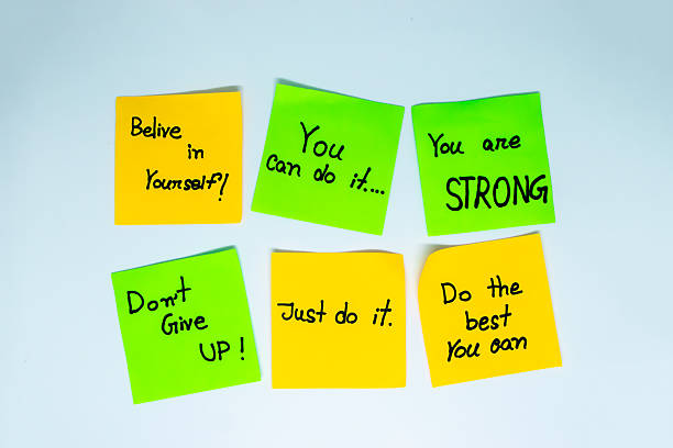 istock Positive affirmations concept. motivation words on sticky note with isolated background 2215638663