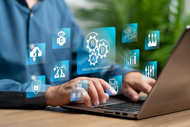 istock RPA, Robotic process automation innovation technology concept, Businessman use AI technology management work automation system, Workflow, Industry, Digital data, Security, Remote control via network 2215638887