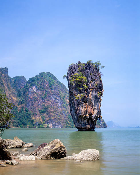 James Bond Island, officially known as Khao Phing Kan, is a renowned limestone karst in Phang Nga Bay.