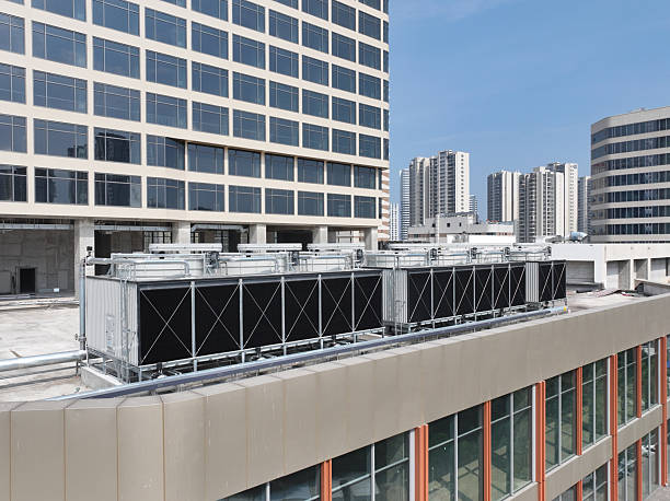 istock Large HVAC units on city background 2215642401