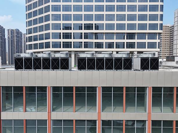istock Large HVAC units on city background 2215642412