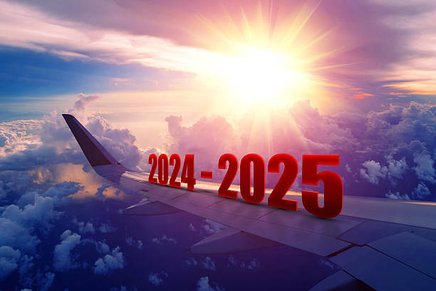 istock Airplane wing flying at sunrise in 2024-2025 2215644623