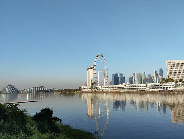 istock downtown Singapore viewed from across the river 2215650816