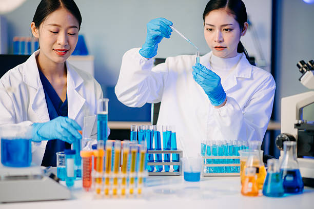 istock Two female biotechnologists testing new chemical substances in a laboratory. 2215652025