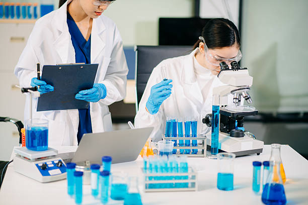 istock Scientist team meeting and writing analysis results in the laboratory study 2215652068