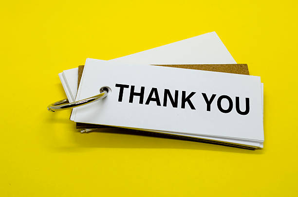 istock THANK YOU text on white notepad. A Simple Gesture, A Powerful Message of Recognition and Encouragement 2215658172