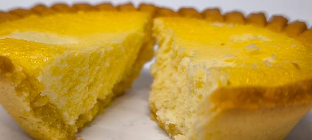 istock Egg tarts that are crispy on the outside and soft on the inside. Egg tarts that have a rich and creamy egg aroma. Egg tarts on white background. 2215658241